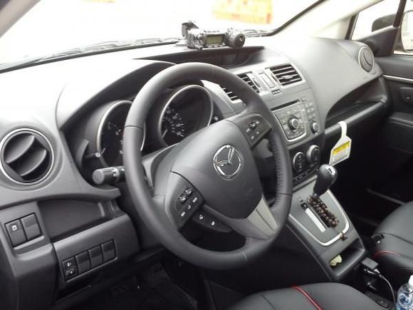 Clear Water Blue Mica Exterior, Black Leather Interior