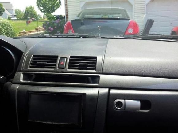 This is the before pic, as you can see it was basically all black. If you look right above my headunit, that little slot is where I put my usb plug. I figured when will I ever actually store anything there.