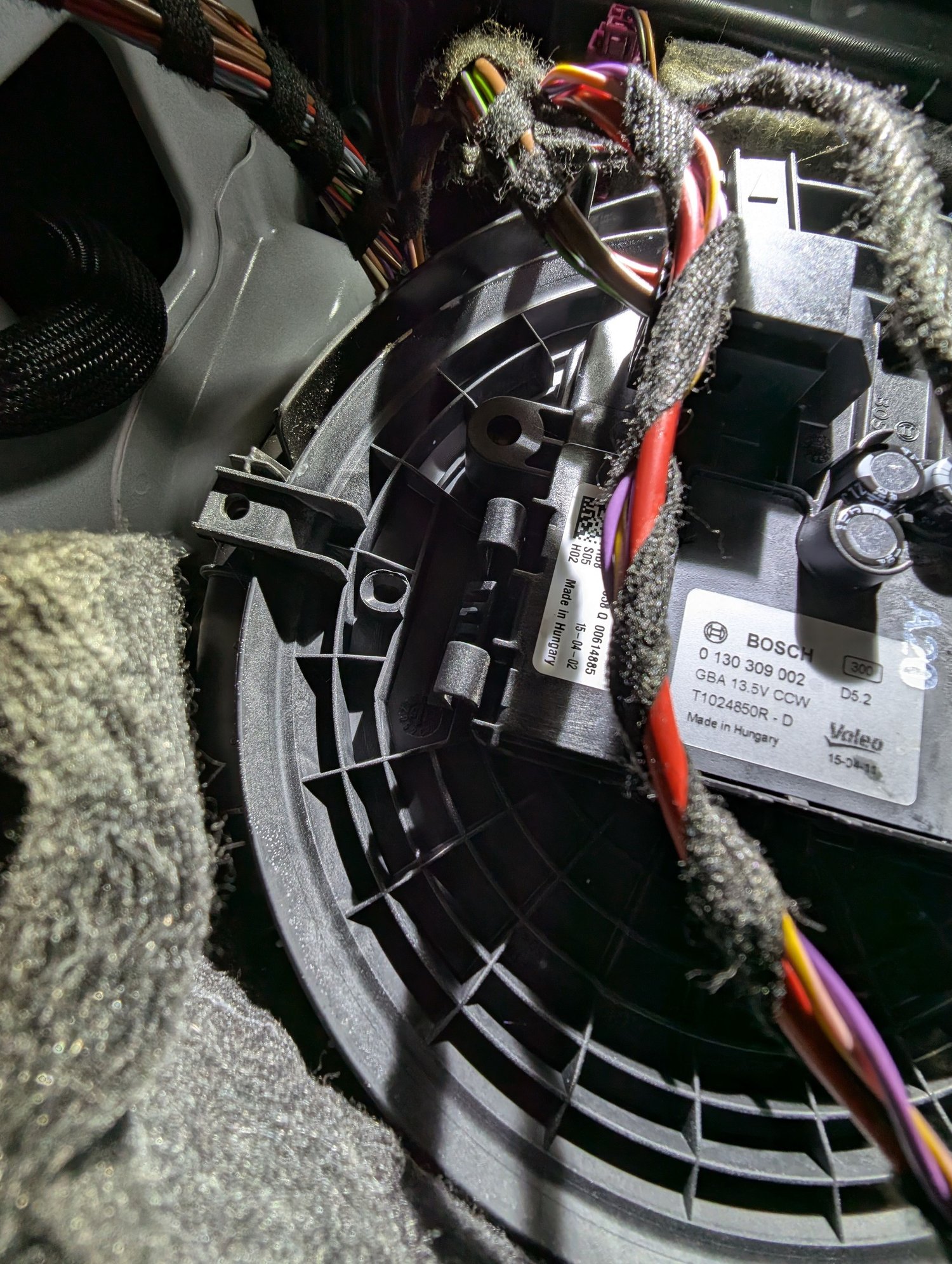 Photo of blower motor (before I snapped the tabs)