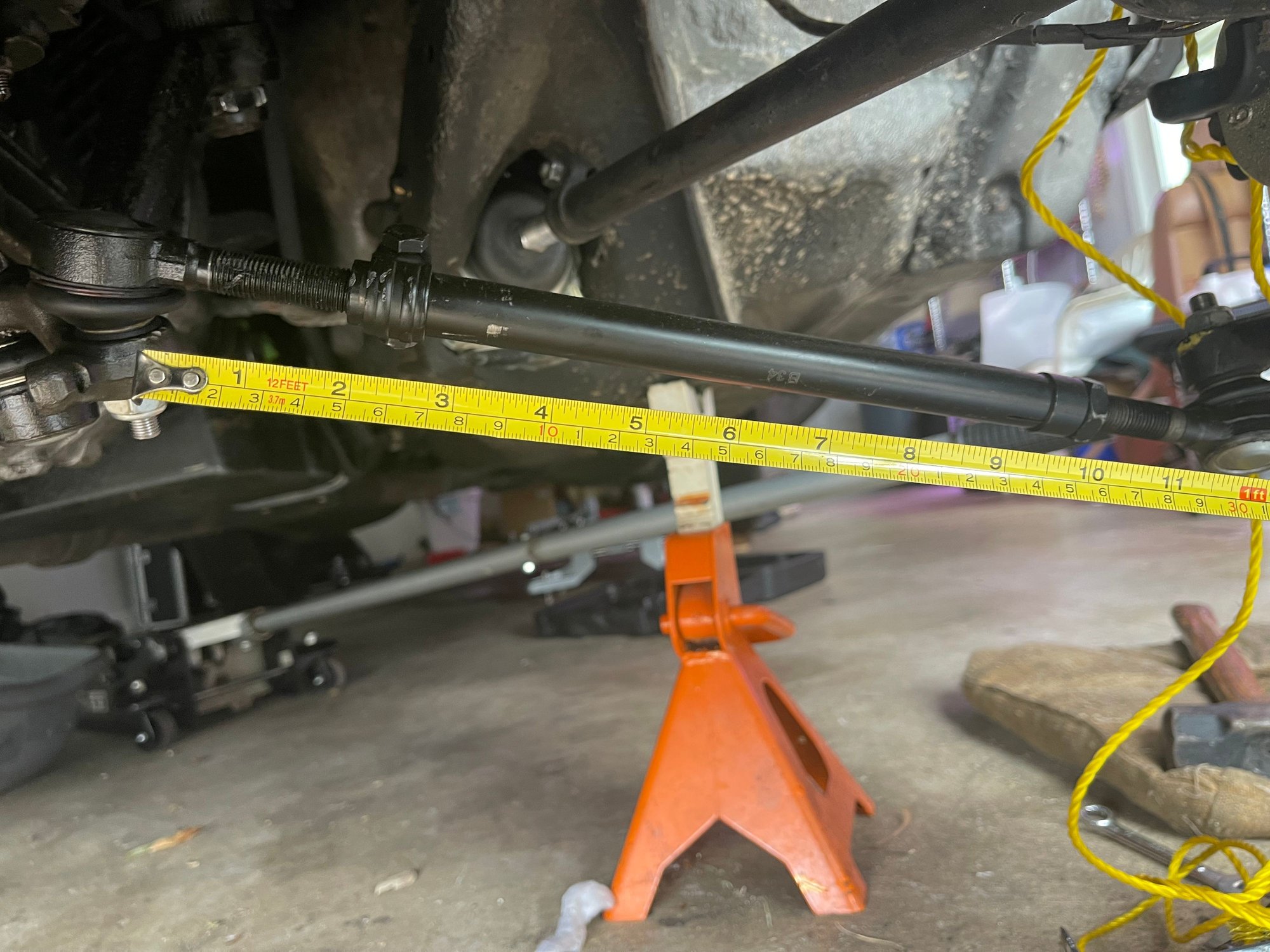 Overall length of drivers sire tie rod assembly is 15�.