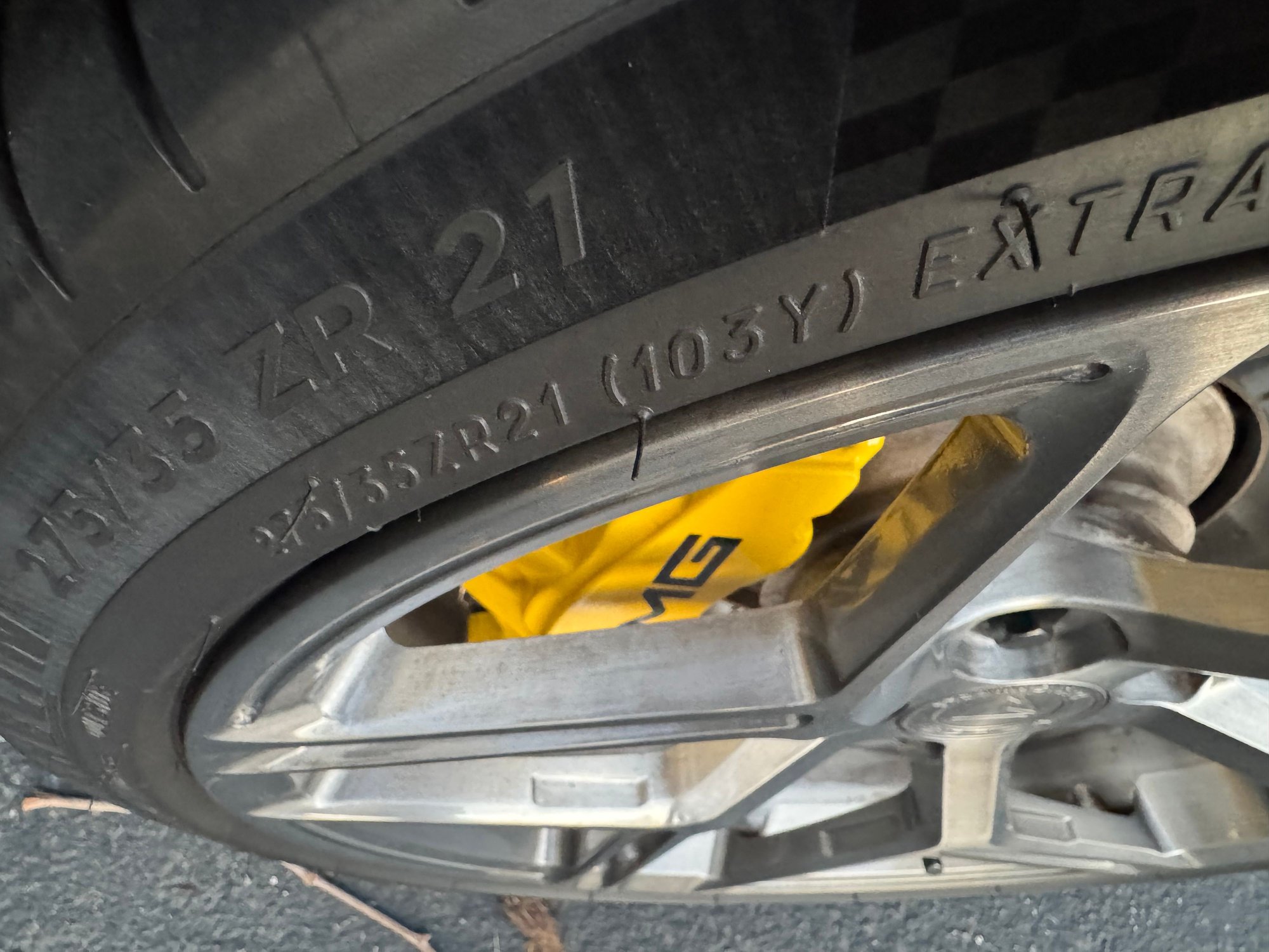 Not sure if this angle properly shows the distance from caliper to wheel, I can take another with a tape if folks are interested