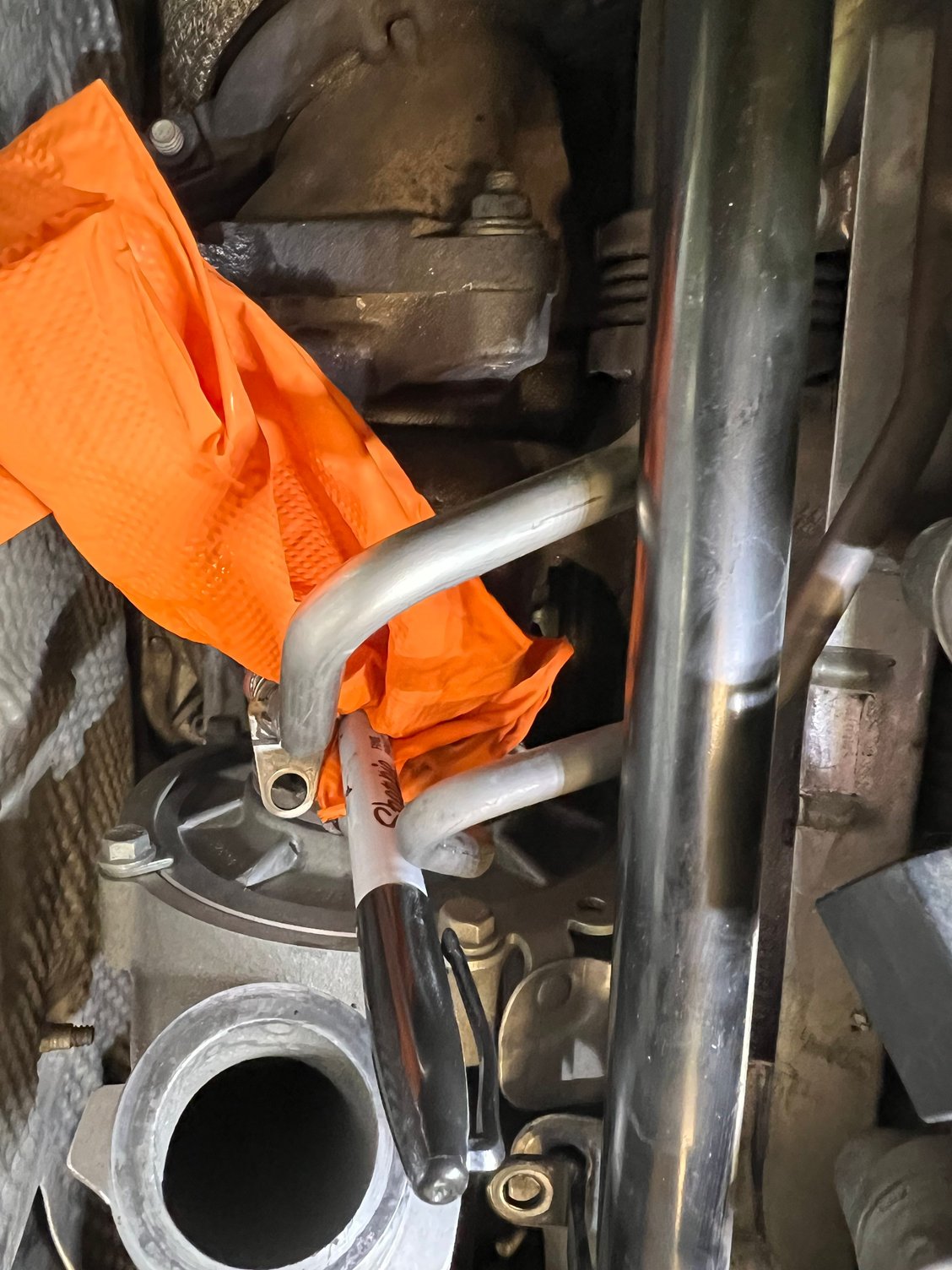 Sharpie and a glove keeps coolant from peeing all over.  