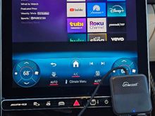 The setup fits in the compartment under the screen or in the glove box (beware of heat buildup in the glove box). You can power the Roku via the usb-a port on the Ottcast device.