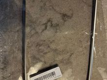 Broken aftermarket console trim piece.