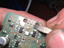 These are the three points on the PC board that you must re-solder the switch to