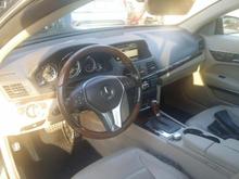 7 speed with paddle shifters, distronic, brake safe , we prefer the black floor mats for contrast