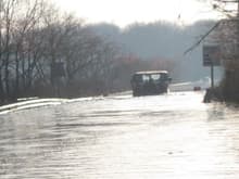 Over 1 mile of interstate was under 3-4 ft of water... I had so much fun with my truck... videos on youtube search rih1usa