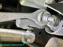 Spring link position before camber adjustment.