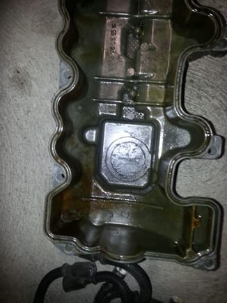 Had some darker oil spots on the inside of the valve cover.