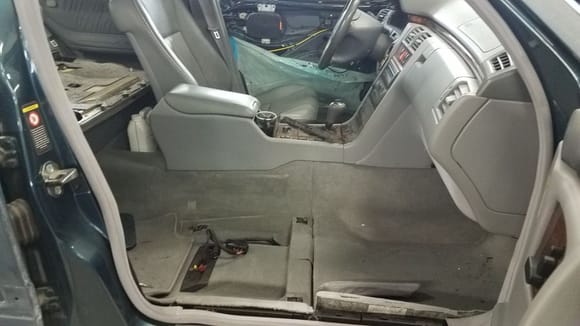 removed the passenger seat in order to pull the carpet back when welding