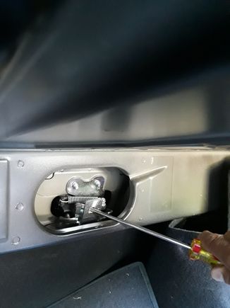 Then from inside the trunk... slide these 2 levers/latches over and then the backrest can come out... what a fucking pain...