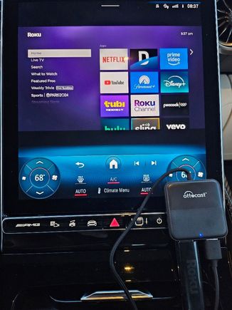 The setup fits in the compartment under the screen or in the glove box (beware of heat buildup in the glove box). You can power the Roku via the usb-a port on the Ottcast device.