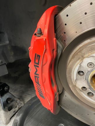 You can see the paint peeling and chips.  Luckily Porsche Guards Red is a PERFECT match for the calipers.  I’ll link the touch up paint below.