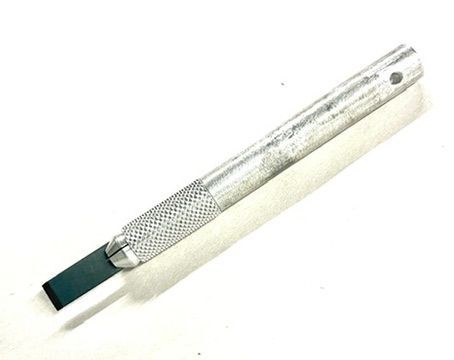 Chisel tipped Xacto tool.