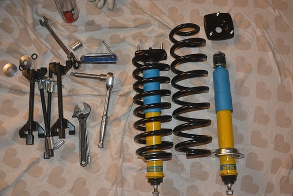 I had to use 4x spring compressors as these coil springs are long and thin. Top mounts and springs are also Bilstein.