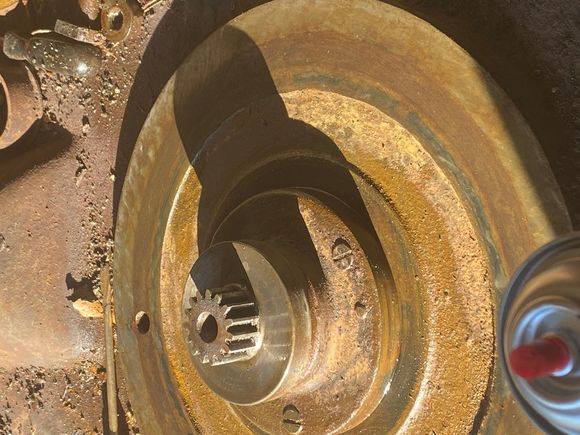 Somewhat cleaned up, some of the flaking starting to show through the “patina.”  

The spur gear engages a rack on the slider which will advance or retract the grinding wheel relative to the work being machined. 

This is the last stage of a DEEP gear reduction.  Every 4 clicks on the feed wheel ratchet at the operator’s station rotates the spur gear enough to advance or retract the wheel slide a distance of .0005” or .012mm

This is no ordinary spur gear.  Can’t just order one of these...