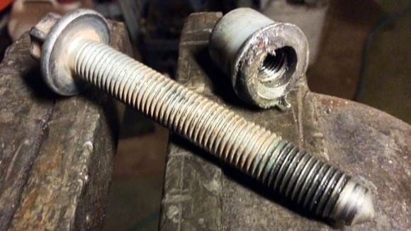 Bent bolt and thread stripped on locator