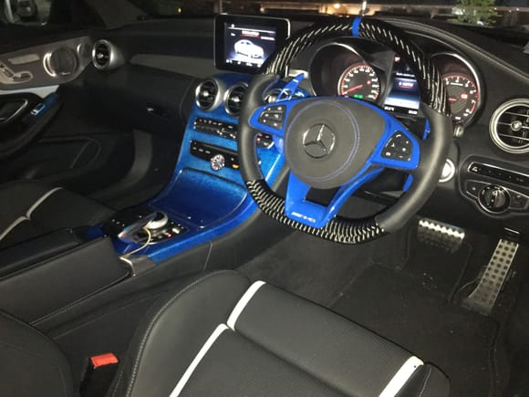 C63s coupe with Revotech Kandy blue carbon center console and carbon steering