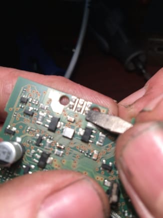 These are the three points on the PC board that you must re-solder the switch to