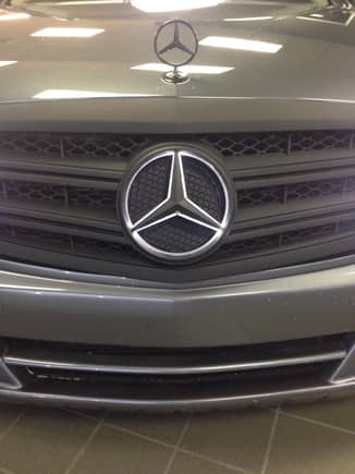 Illuminated star after installation in new grille