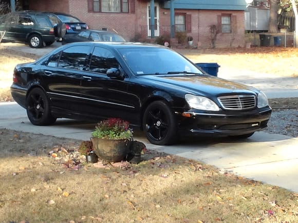 Had the wheels painted!  Also blacked out window trimming.