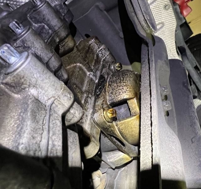 Chirping noise from transfer case/transmission when in P