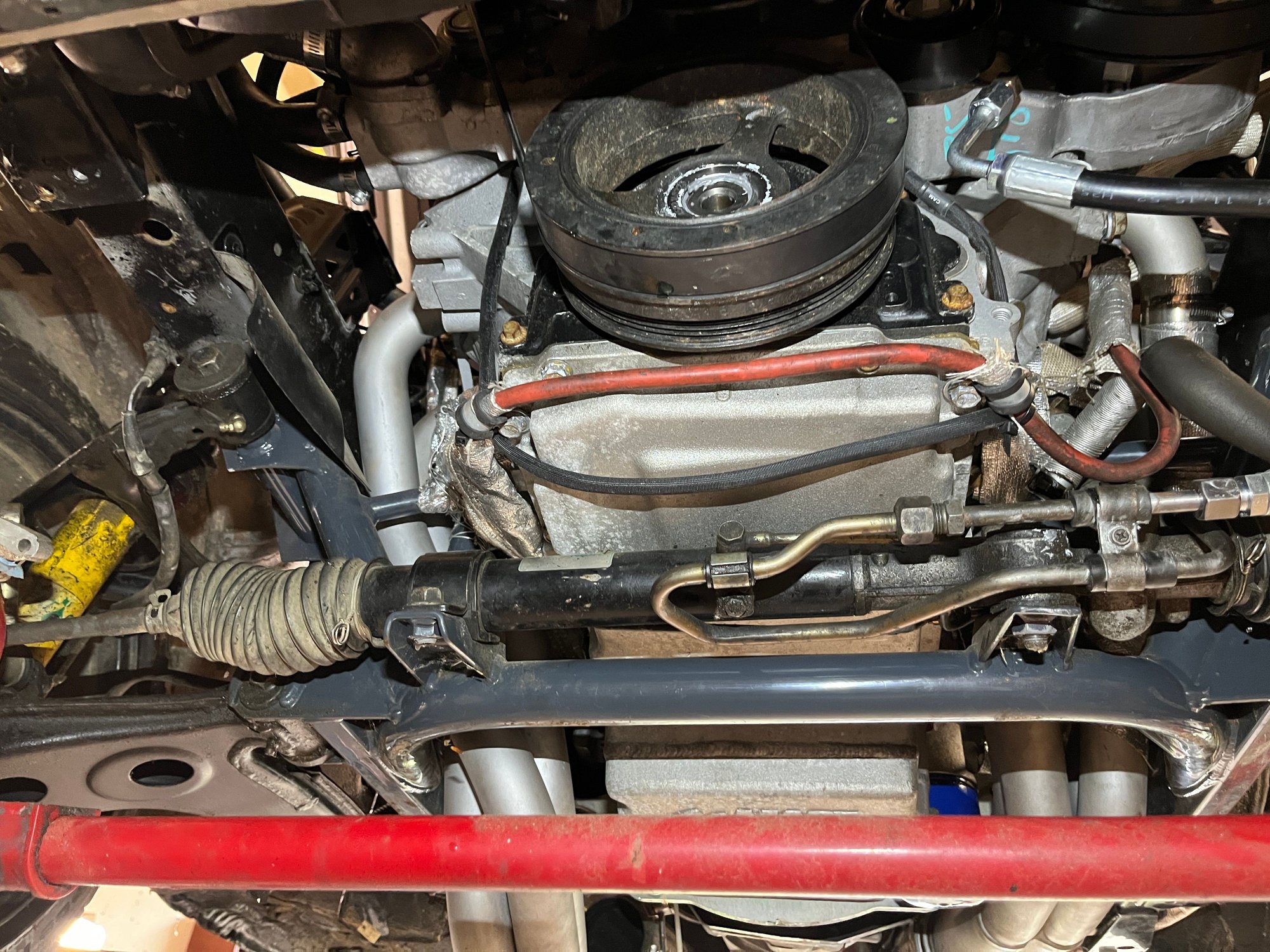 Using 2 new bolts, install the first at 240 foot pounds then remove the bolt. Insert new bolt to 37 pounds and then turn an additional 140 degrees.