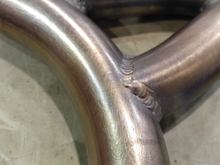 First ever weld with DOM tubing. I am an Engineer, not a professional, but we did test our weld penetration and with a little more practice, the minor undercutting was eliminated. Also, using a ~$2500 tig setup helps.