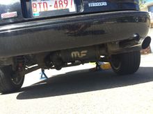 Exhaust fits in cut bumper