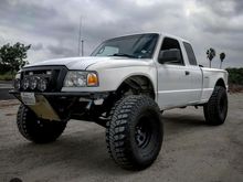 Here she is 3.0 5 speed, upgraded rear end, 35 inch Kevlar reinforced tires, exhaust, intake, lift, got the spare tire setup in the back etc. It's a nice truck, still have it but kinda hard to drive around at 10mpg 