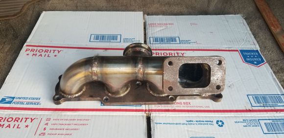 Custom fabricated turbo manifold from Full Race, T3 flange, 44mm wastegate. Very thick and strong. $500