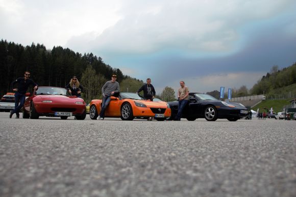 Me and the crew with our cars. The orange one is an Opel Speedster Turbo with 930 kg and 280 HP. The Boxster is an unmolested first year example with 60,000 km on the clock. The roadholding capabilities of its stock suspension are beyond belief.