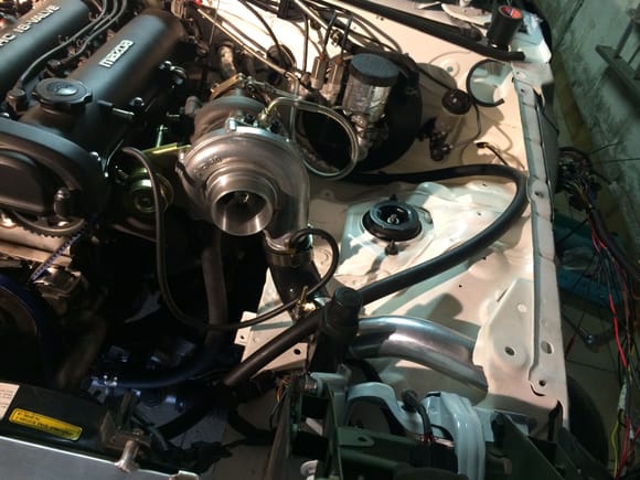 Searching for a way to relocate the coolant hose.
This looks like Shit.