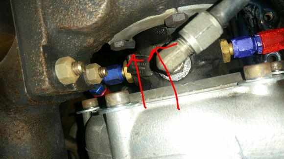 As an aside, there's this picture. I've confirmed that the joins for the feed aren't leaking oil. Where could this be coming from? I thought oil leaking from the turbo seals would show up in the exhaust?