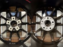 The legit on left does have 1.5 oz of weights and valve stem on the wheel. The replica is bare.