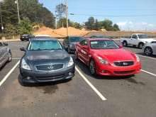 My Blue slate sedan beside a random Red Coupe!