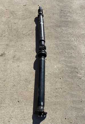 Sedan driveshaft with flex coupler. $140 pickup only