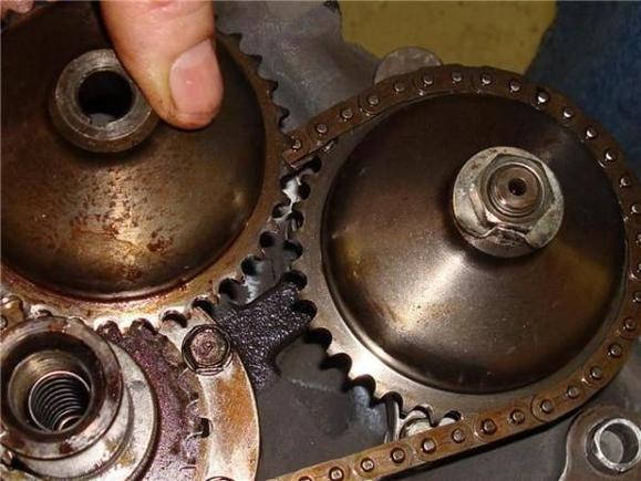 new oil pump gear beside the old one.  think I might use the old one as a circular saw