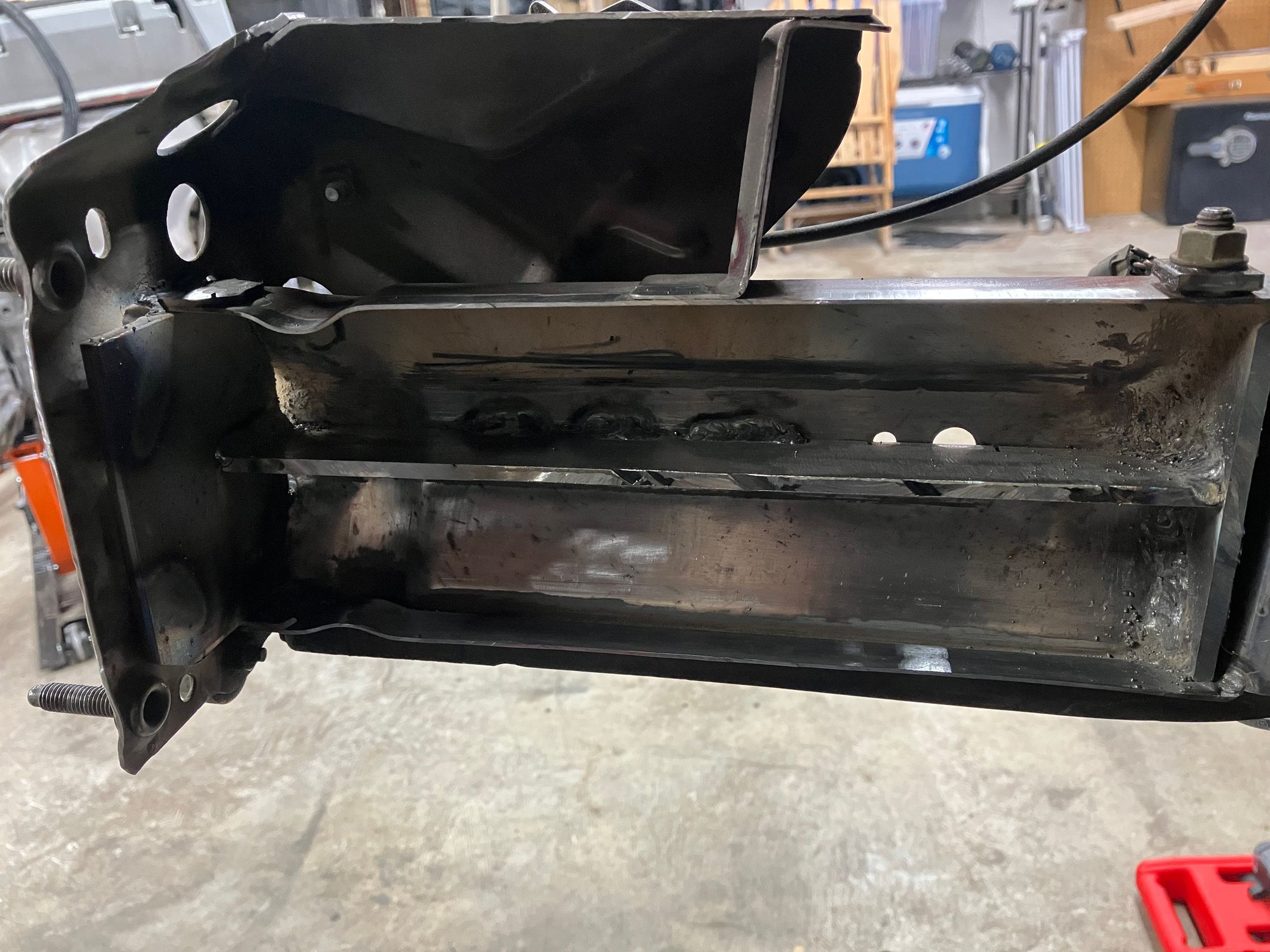 It may not be necessary but I figured with the frame rail being half the thickness it once way it would be good to brace it internally as well. I put a thin plate of 3/16 steel in so the rail would resist bending outward.