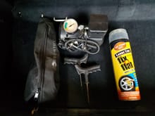 Emergency kit in the absence of run-flats. Large Fix a Flat, plugging kit, small compressor.
