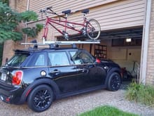 Rocky Mounts tandem carrier on Mini rails and roof rails.  I was leery of hauling tandem on aftermarket rails.  I used to have this on Clubman and was able to mount in right direction, but with R 55 the hatch would hit carrier. One advantage Og Clubman, but love the F