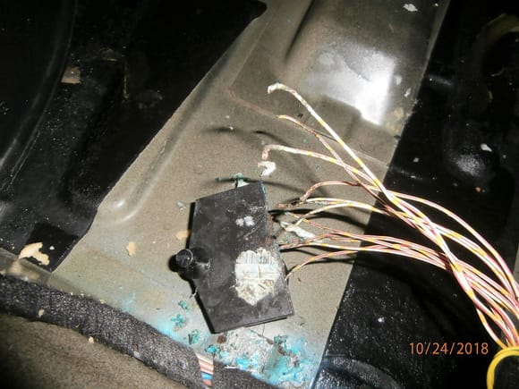 Corroded K-bus wire connection under the passenger carpet