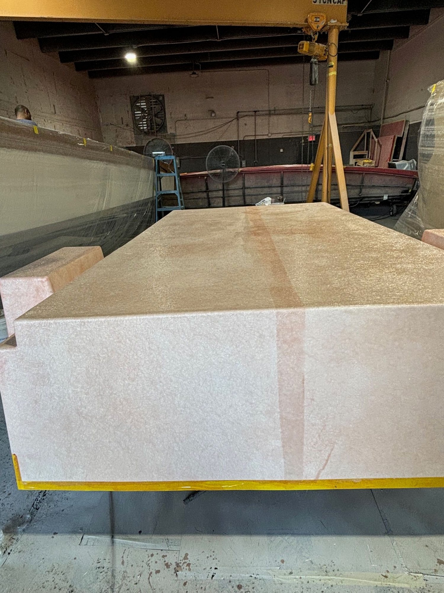 The skin coat on the cockpit part being made for this boat.