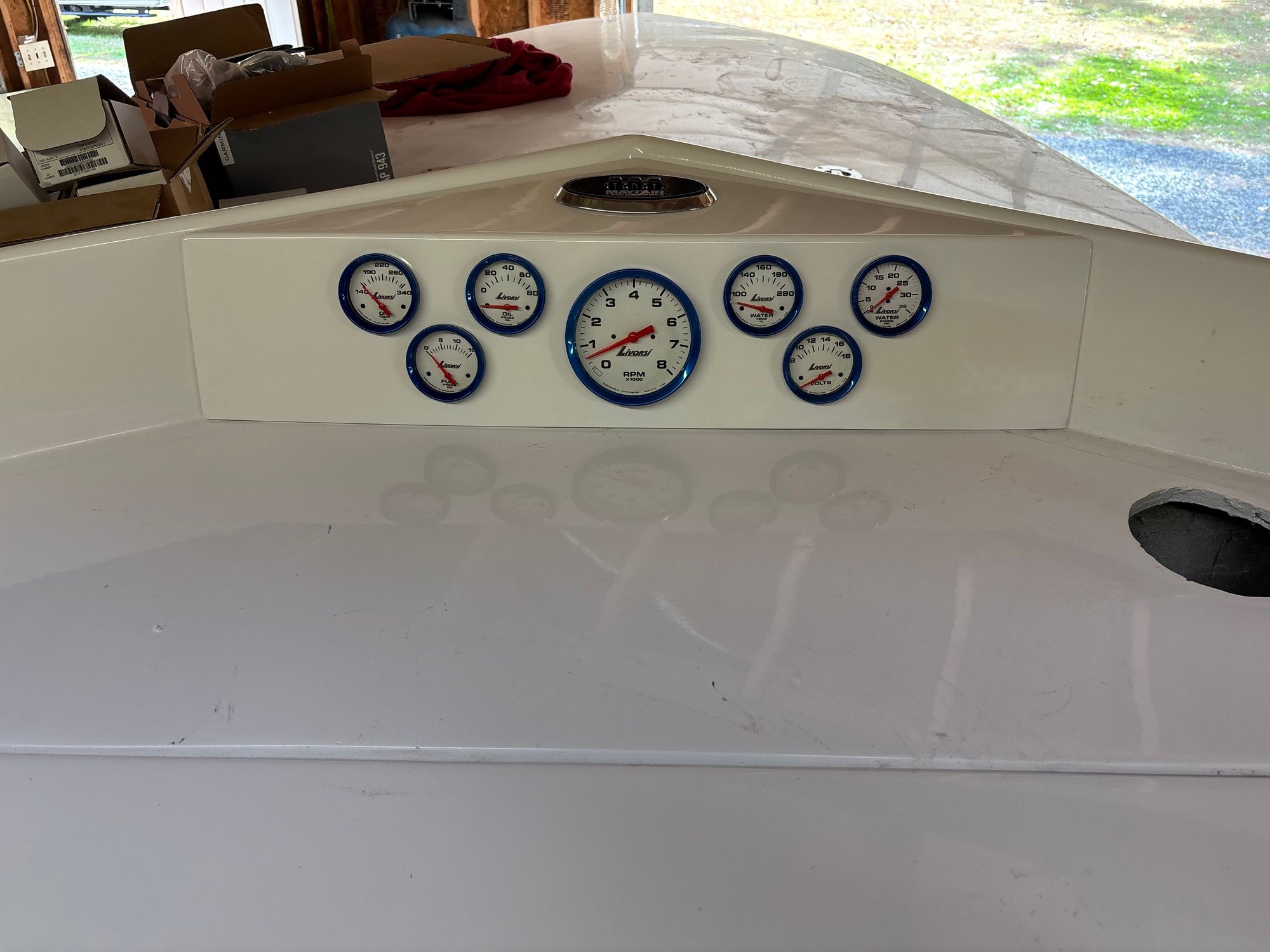 Gauges and pop up indicators installed. Left the hole for the compass because some rules state you need one. Going to make a block off plate for it incase we ever need it back in it will be easy. On to wiring and firing it up!