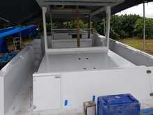 These are pics of the subbed. No molds outside the hull and cap, all the pieces are hand made; foam and glass, so lots of corrections to get perfect flat surfaces 