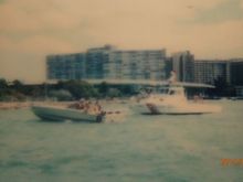 1976 36 Wide Body. No reg numbers on the boat.  It was full of dancers too.  My friend, I snap this polaroid from my Scarab.
