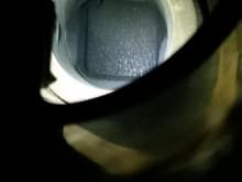 This pic is inside the curve of the alum elbows.  Shows the droplets you were asking about.  You should see something similar on your headers and look in the exhaust port toward the exh valve especially, not just in the header. 