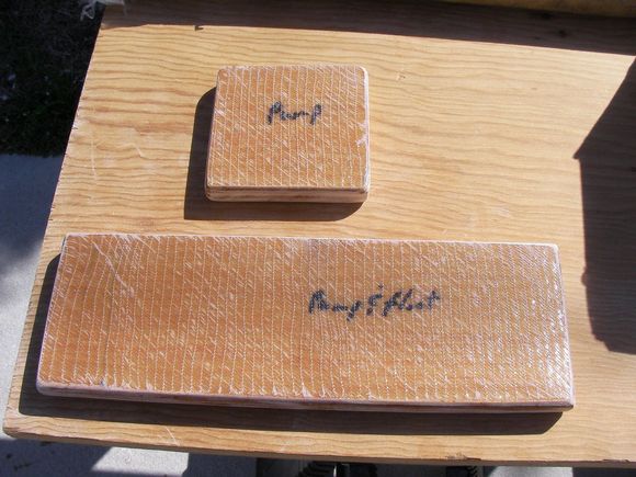 the pump pads get glass on 1 side
so when they're installed the bottom isn't bare wood