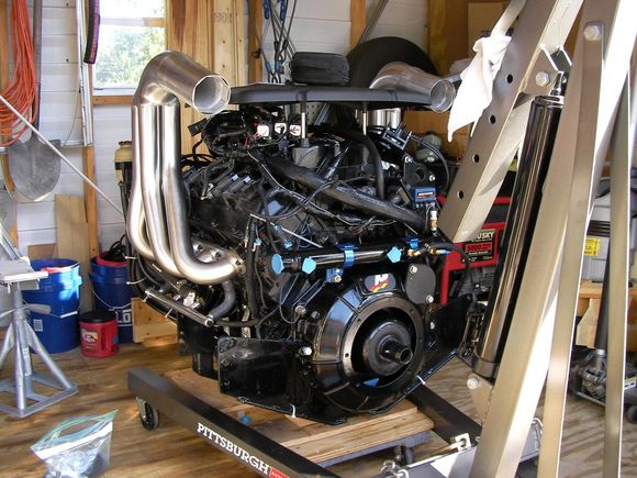 the kit, well the relocation kit didn't need much modification and the stock wires for the exhaust sensors are long enough. except the whole port side of the wiring harness needed to be unwrapped to move the pcm to the new plate it was a full day. 