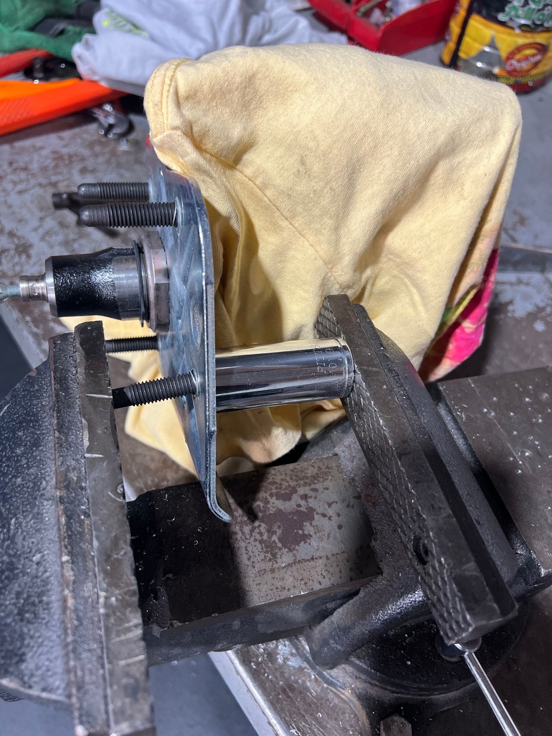 Pressing out one of the studs because it doesn�t match the holes in firewall. 